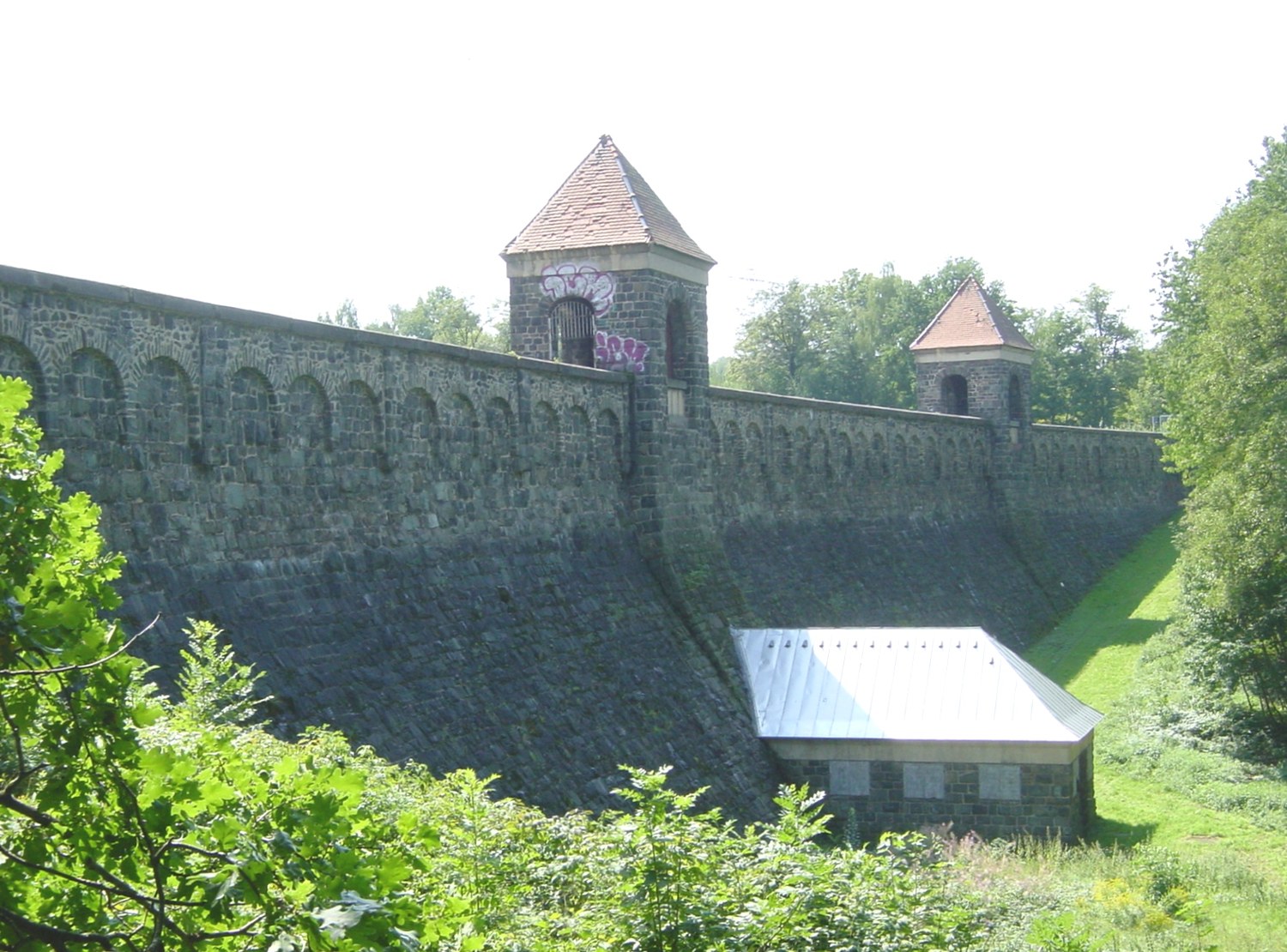Downstream face of the Euba reservoir dam